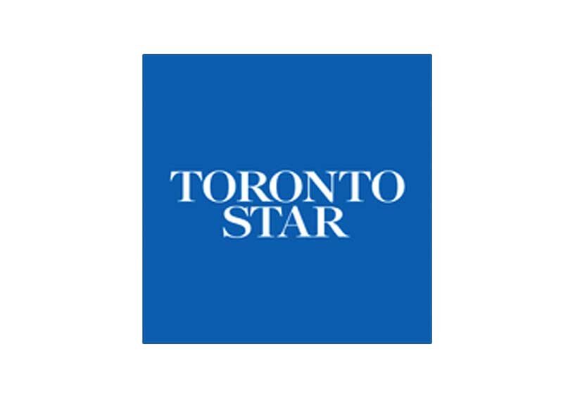 A blue square with the words toronto star written in white.